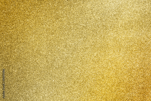 close up golden glitter texture for glamour holiday background