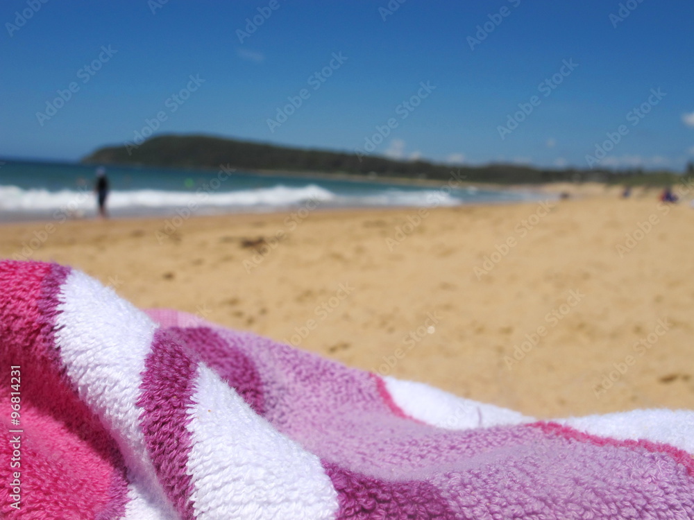 Close up pink beach towel on the beach 2 Close up pink beach towel on the beach 2