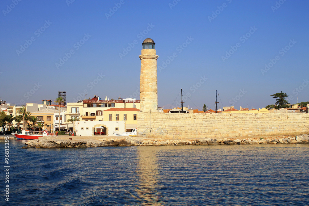Old venetian lighthouse at harbor, Rethymno, Crete, Greece