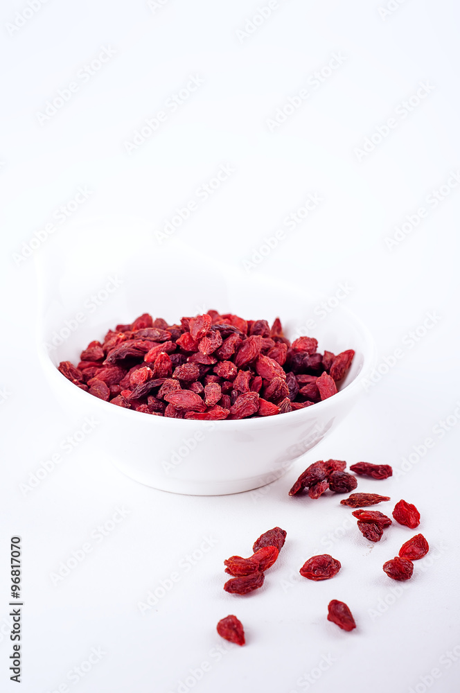 Dried goji berries, isolated on white background Dried goji berries, isolated on white background
