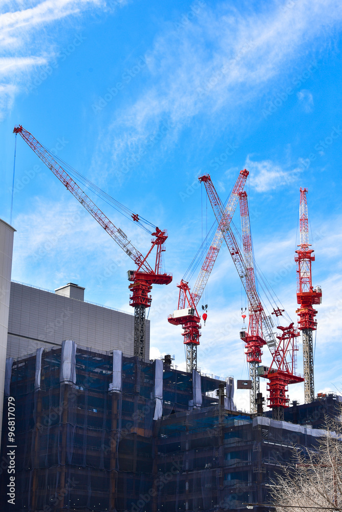 construction cranes on top of building construction cranes on top of building