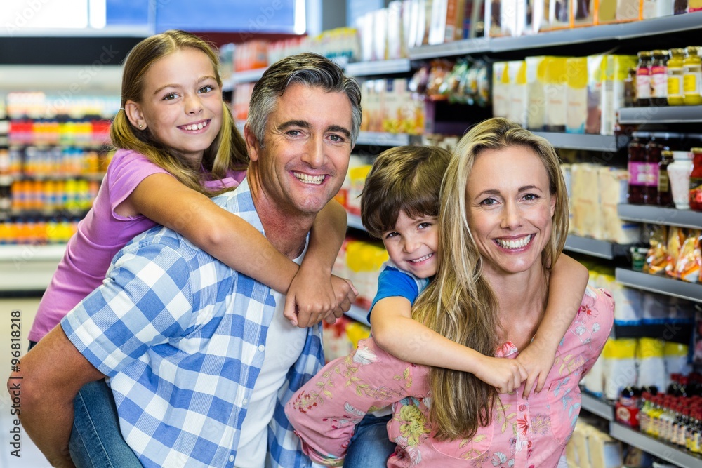 Fototapeta premium Happy family at the supermarket