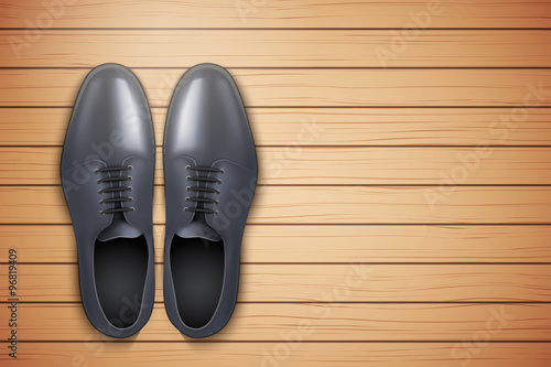 Classic Men Shoes on wooden background