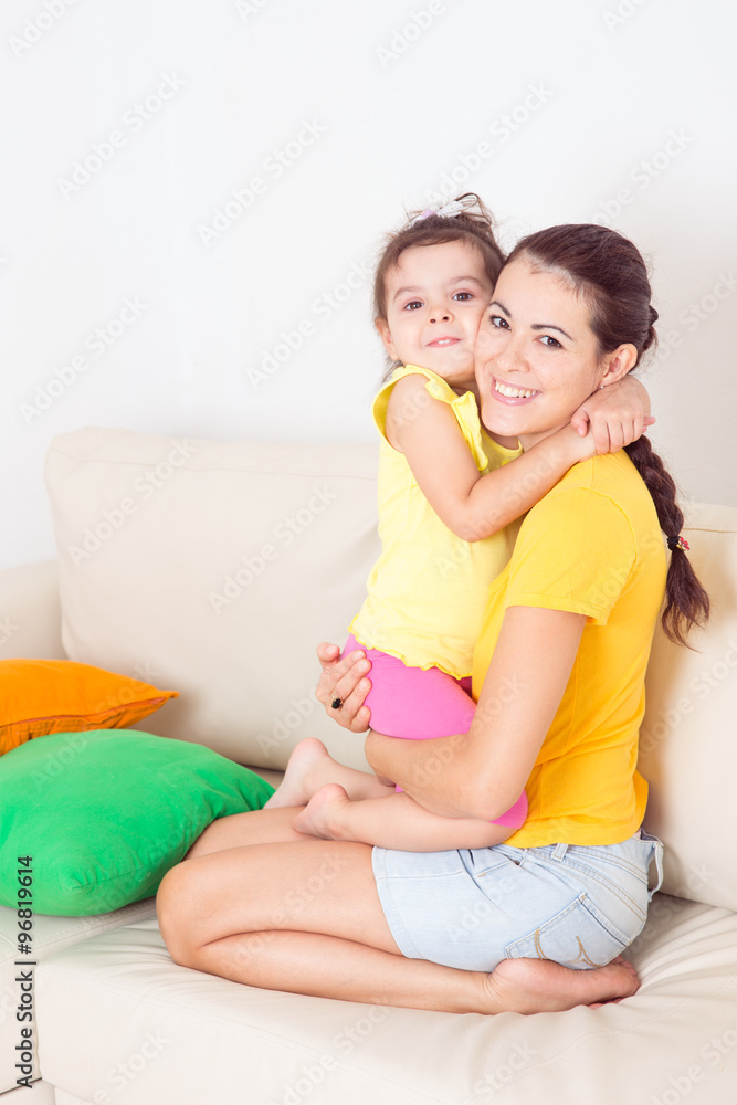young mother with her baby young mother with her baby