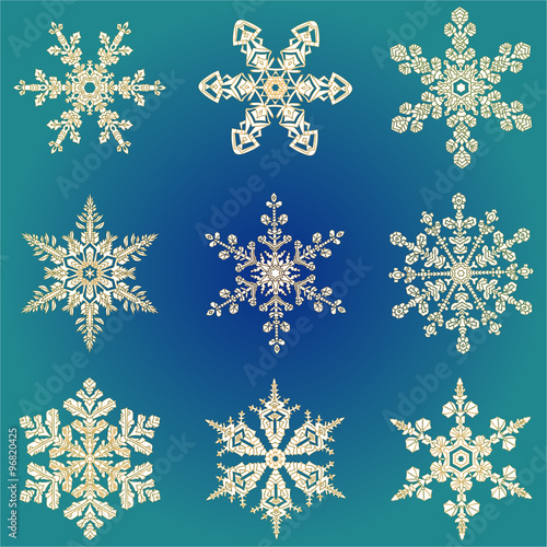 Set hand-drawn doodles gold colored snowflake Festive seamless pattern