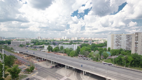 Traffic on the elevated road timelapse overpass on Yaroslavl highway in Moscow photo