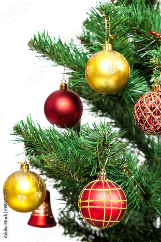 Christmas tree with baubles on white background.