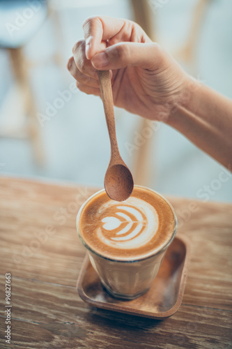 woman hand with cup of coffee