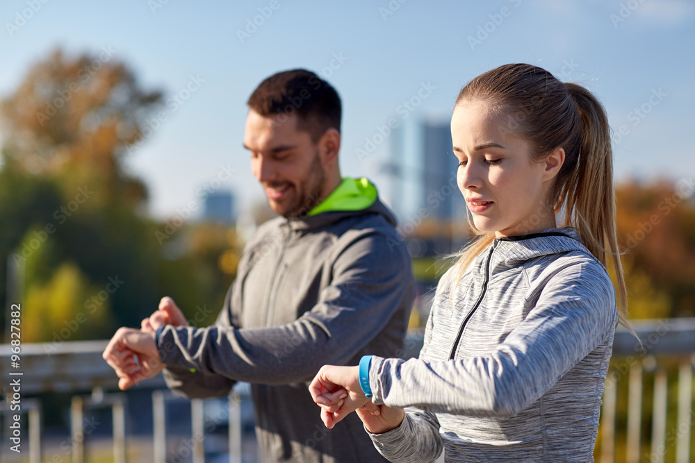 couple running over city highway bridge couple running over city highway bridge