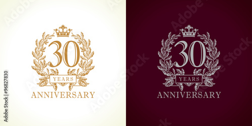 30 anniversary luxury logo. Template logo 30th royal anniversary with a frame in the form of laurel branches and the number 30.