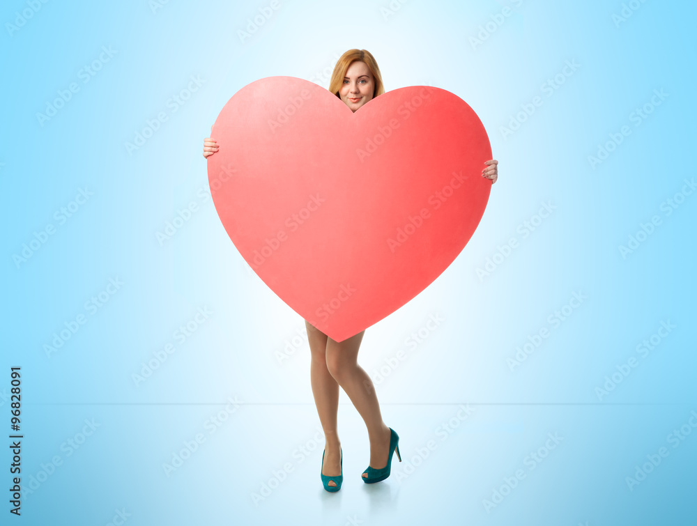 Beautiful young woman with love in his hands Beautiful young woman with love in his hands