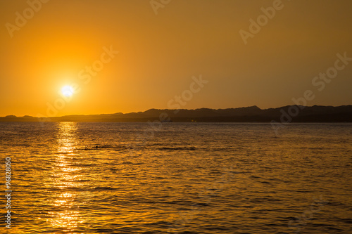 Golden sunset over the sea © oleg_mj