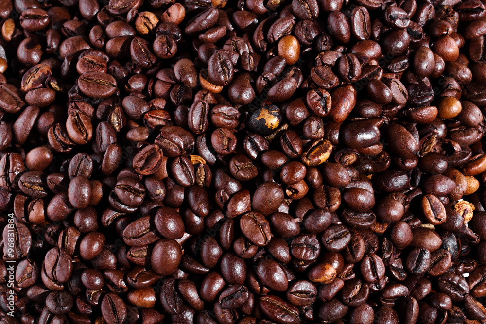 Background with many roasted coffee beans Background with many roasted coffee beans