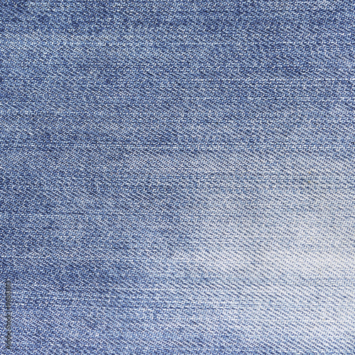 Texture of blue jeans textile close up