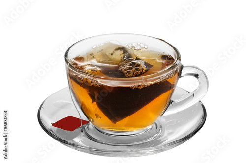 A cup of tea with tea bag, on white background
