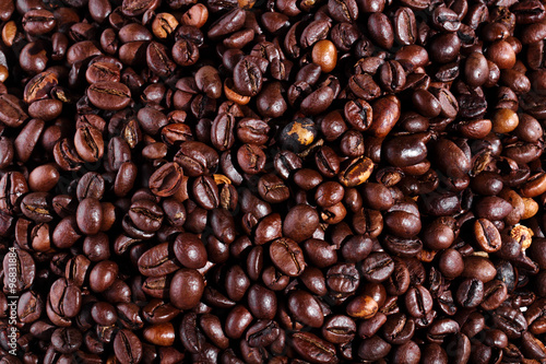 Background with many roasted coffee beans