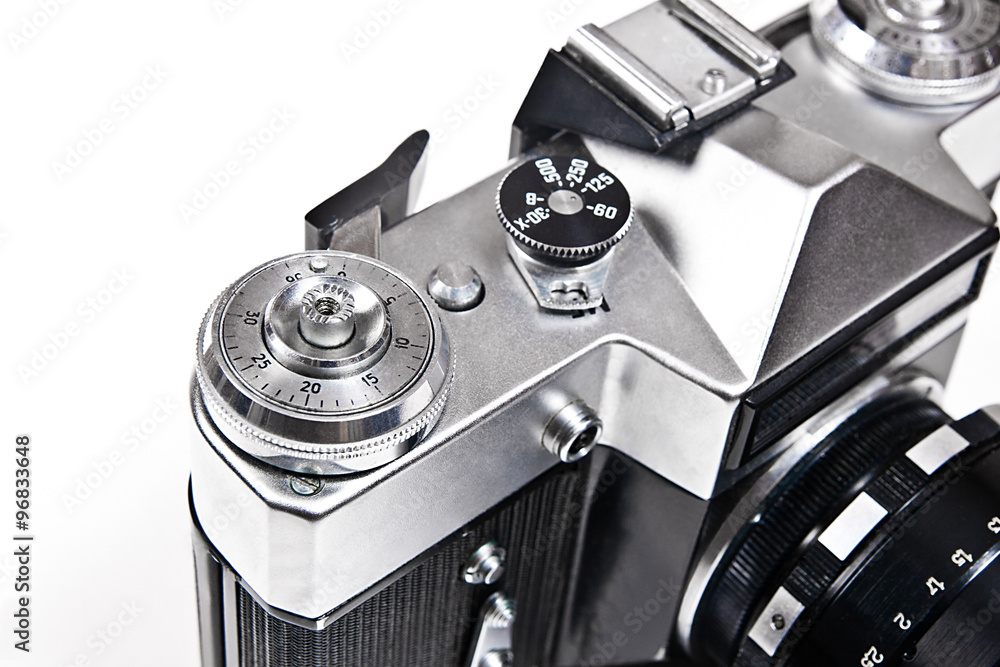 Close up view of old retro camera on white background. Close up view of old retro camera on white background.