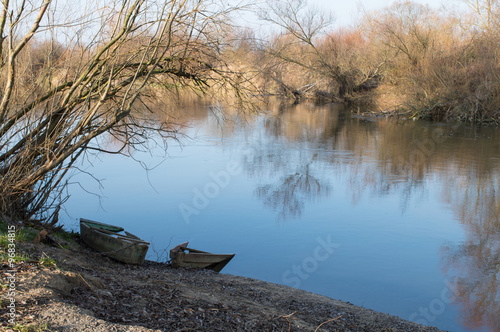 sunken boats on the river