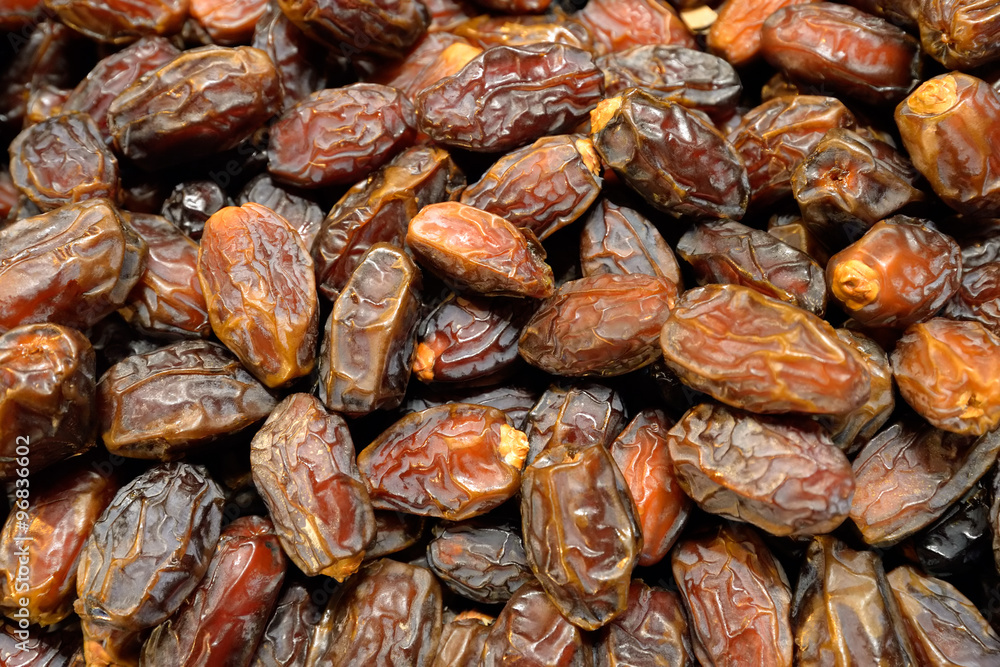 Background of dried dates fruit, at the open air market. Background of dried dates fruit, at the open air market.