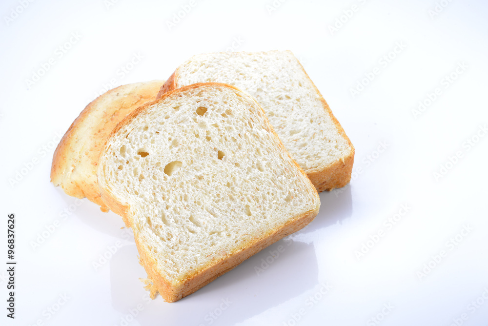 Bread cut pieces on whtie background.