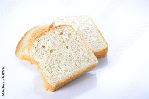 Bread cut pieces on whtie background.