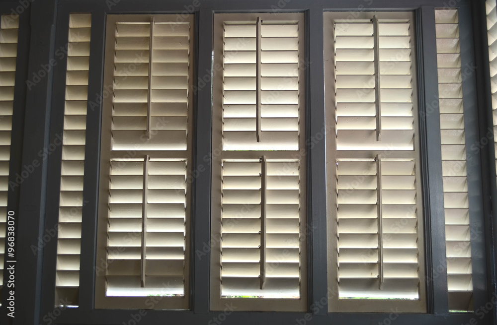 White and grey wooden window White and grey wooden window