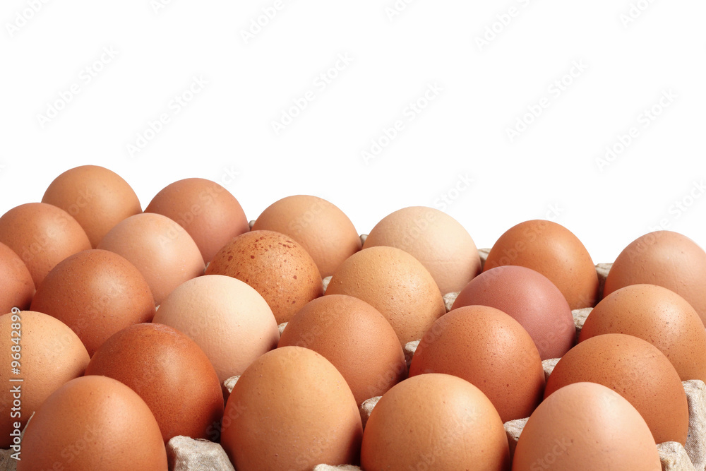 Chicken brown eggs in carton on white background. Chicken brown eggs in carton on white background.