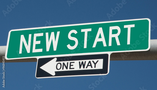 New Start on green overhead highway sign with one way arrow  © Rex Wholster