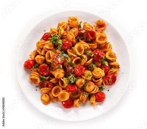 Orecchiette pasta, tomato sauce and vegetables photo