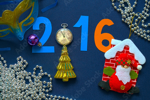 New Year background with date, mask, pocket watches and herringbone