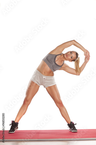 young athletic woman doing exercises