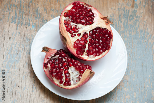 Wallpaper Mural pomegranate on the table Torontodigital.ca