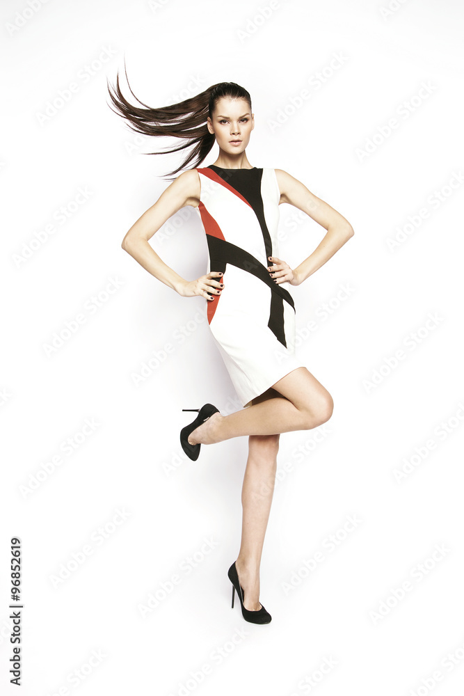 Brunette woman in fashion dress Brunette woman in fashion dress