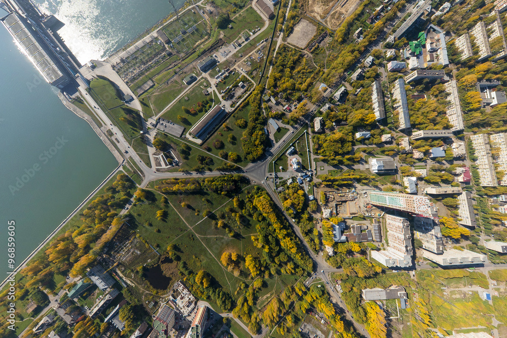 Aerial water power plant view with crossroads and roads, civil buildings Aerial water power plant view with crossroads and roads, civil buildings