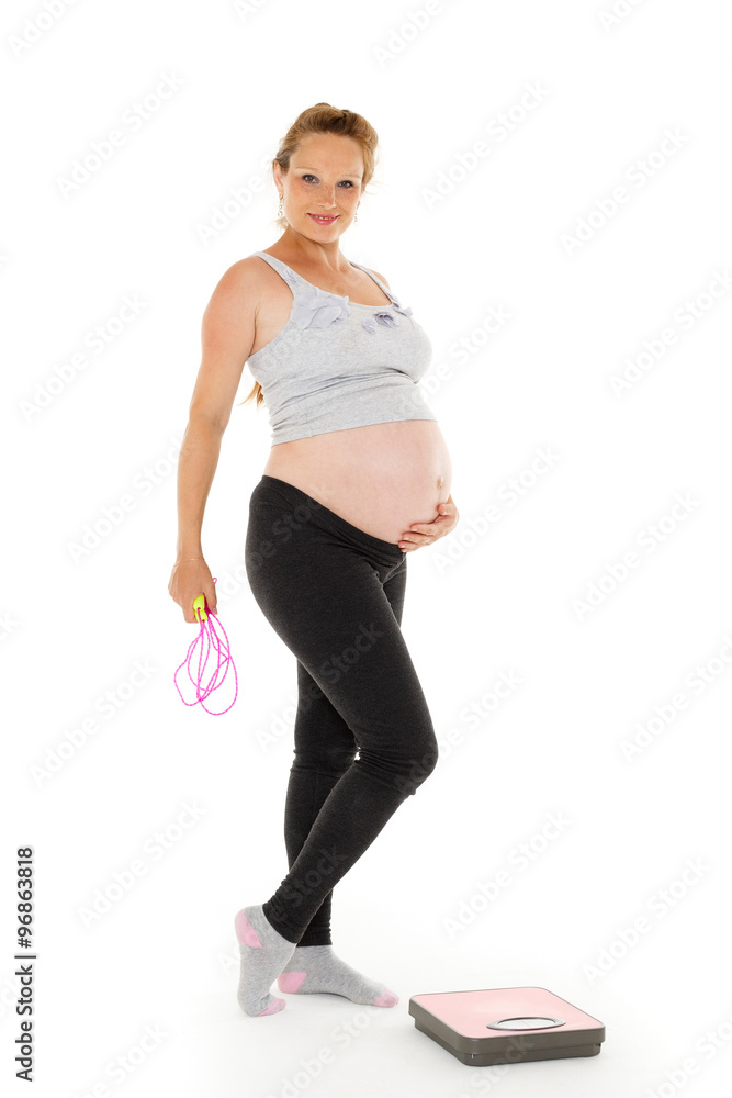 Sports pregnant woman with scales. Sports pregnant woman with scales.