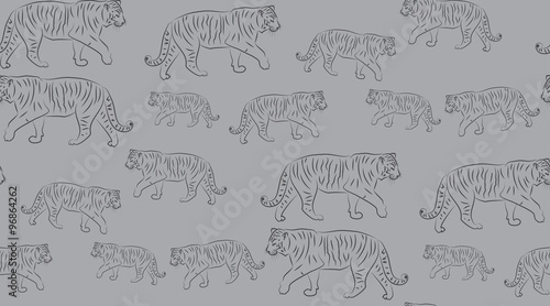 Fototapeta Naklejka Na Ścianę i Meble -  Vector abstract seamless background of tigers. The tigers are randomly located.