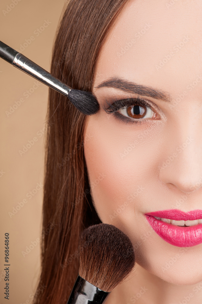 Obraz premium Cute female model is receiving skin treatment