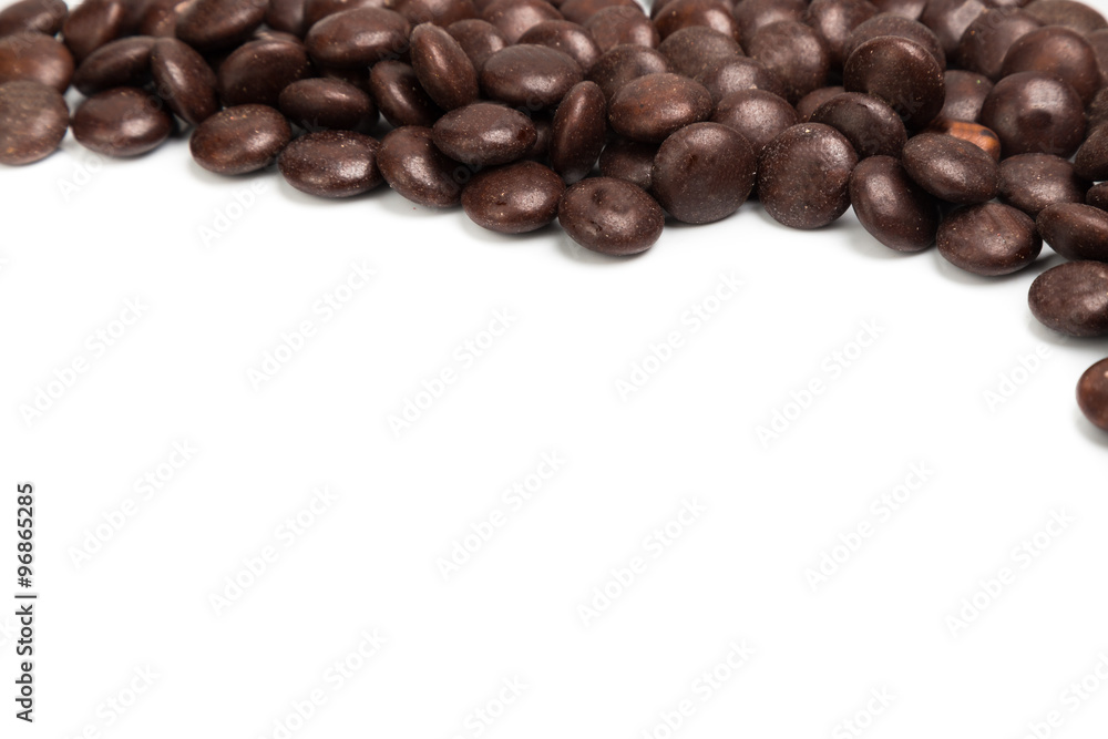 Top right frame of brown chocolate candy on white background Top right frame of brown chocolate candy on white background