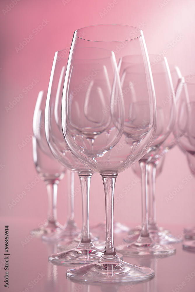 Empty wine glasses on color background Empty wine glasses on color background