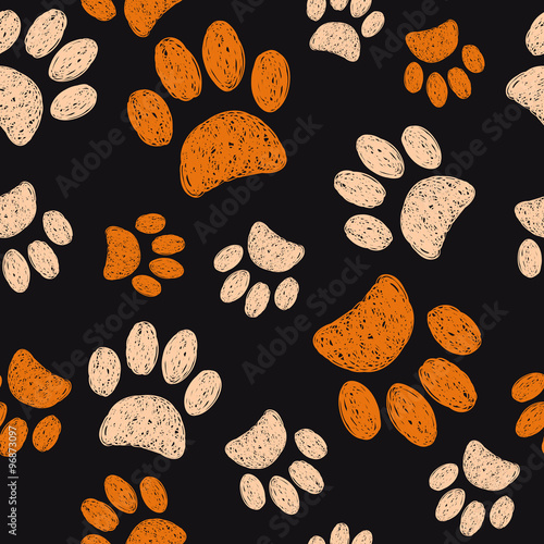 Seamless pattern with doodle paws. Vector illustration of cats footprints on dark background.