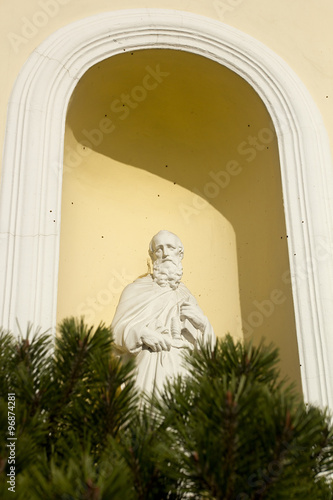 Portico with a high relief of the saint on the facade