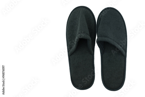 pair of black indoor slippers isolate background