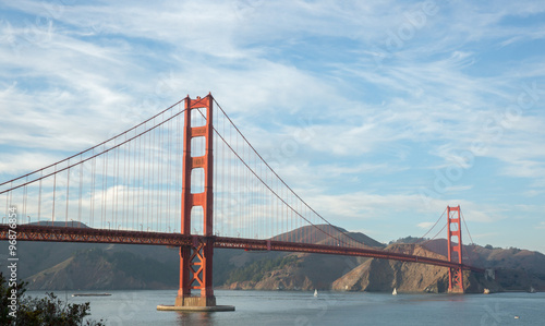 The Golden Gate Bridge with Wispy Clouds. Taken from Battery E Trail near the Golden Gate Bridge Welcome Center.