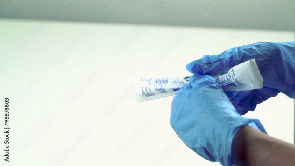 Doctor Gains a Medicine Into a Syringe Doctor Gains a Medicine Into a Syringe