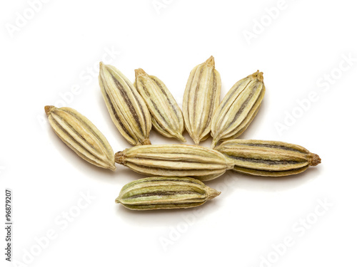 Macro closeup of Organic Fennel seeds (Foeniculum Vulgare) isolated on white background.