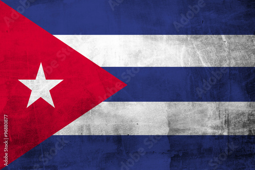 Fotografía Flag of Cuba on grunge concrete wall