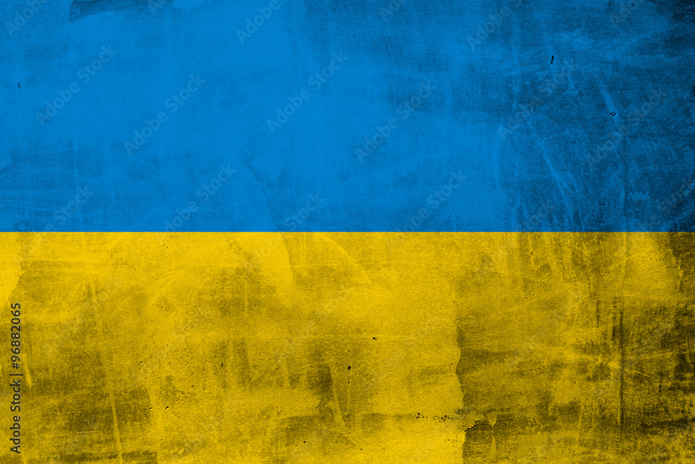 Grunge flag of Ukraine on concrete wall - obrazy, fototapety, plakaty 