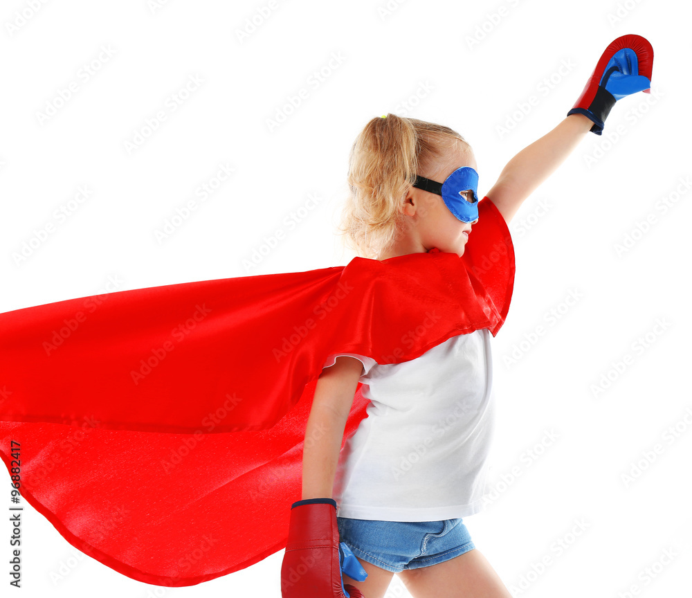 Beautiful blonde superhero little girl with boxing gloves poses in studio isolated on white background Beautiful blonde superhero little girl with boxing gloves poses in studio isolated on white background