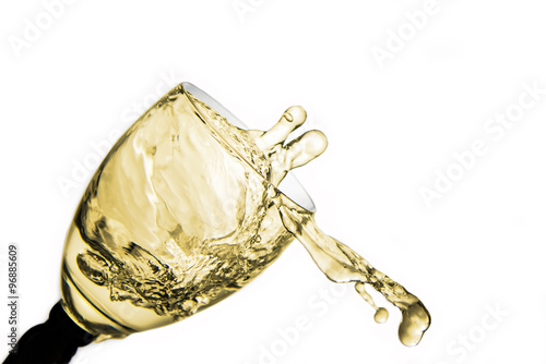Splashing champagne in the wine glass.