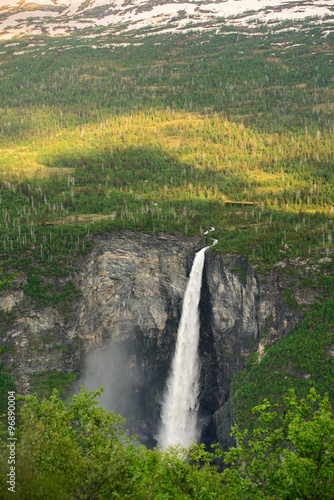 Norwegian waterfall Vettisfossen in Jotunheimen National Park and Utladalen Landscape. Nature and travel background. Power of nature 